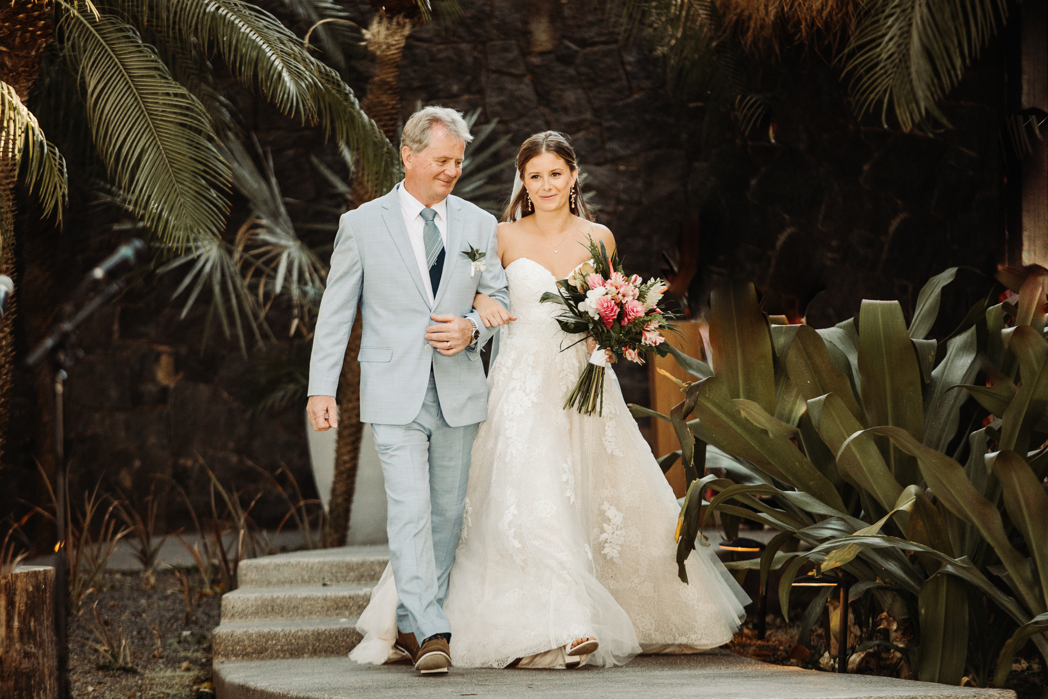 bride and father walking down the aisle