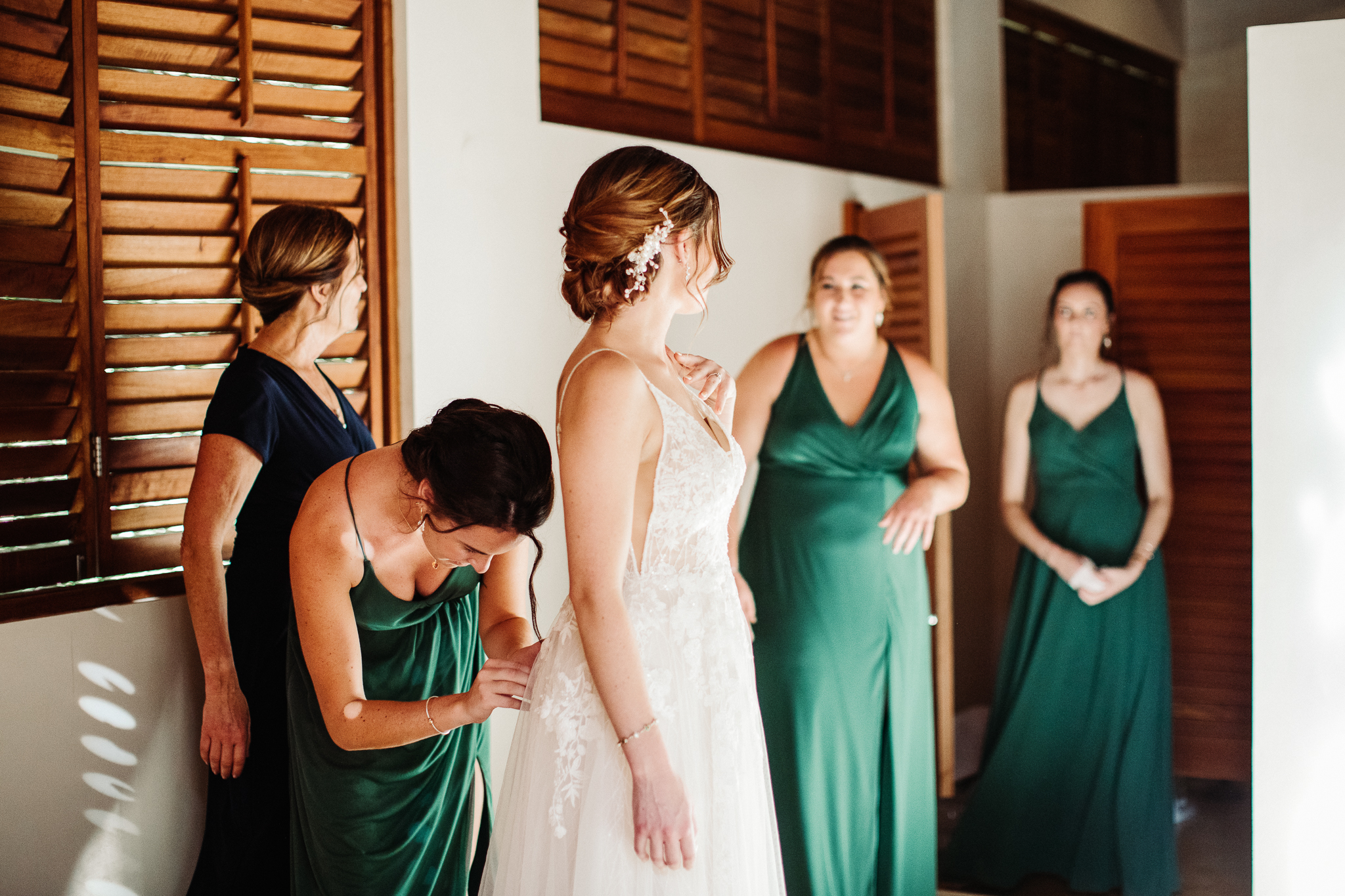 bridesmaids and bride getting ready