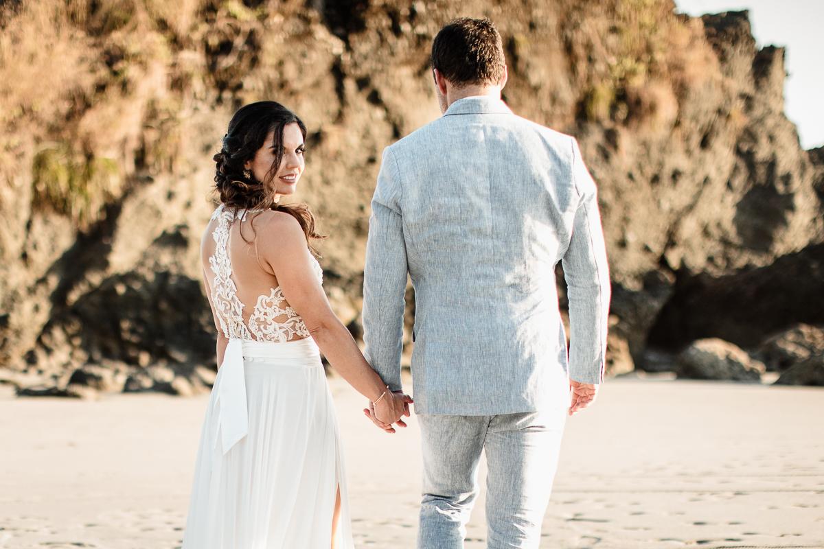 bride and groom on beach