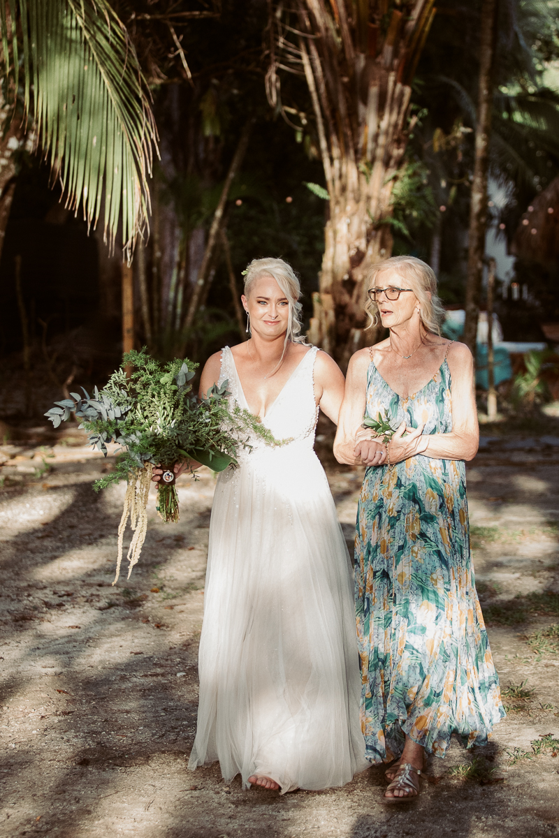 bride and mother enter ceremony